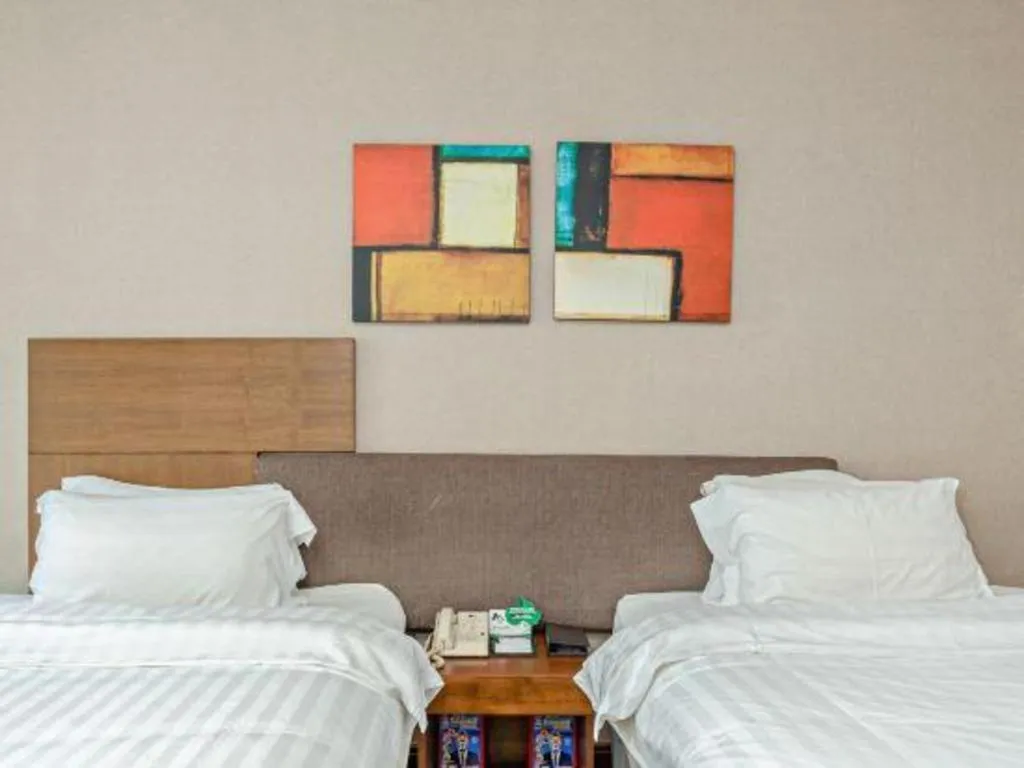 Bed in Poly Hotel