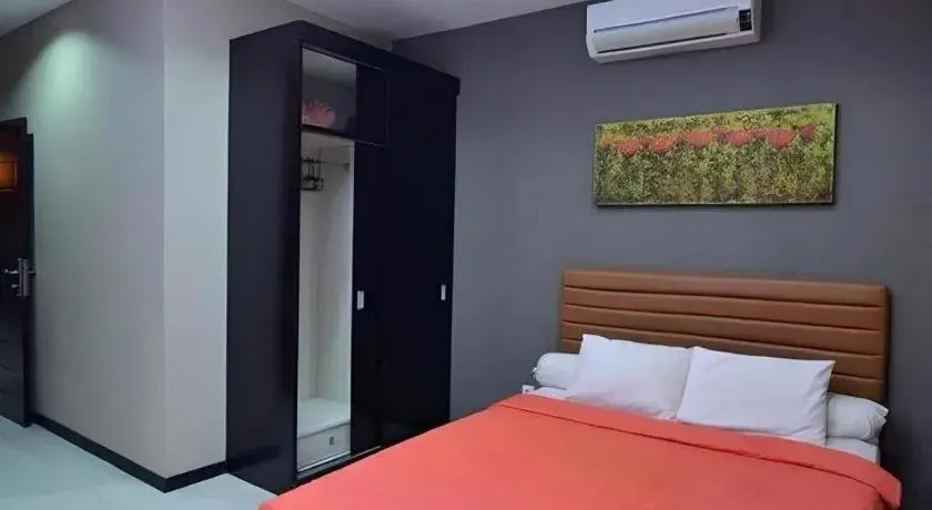 Bed in The Aroma's of Bali Hotel & Residence Bed in The Aroma's of Bali Hotel & Residence