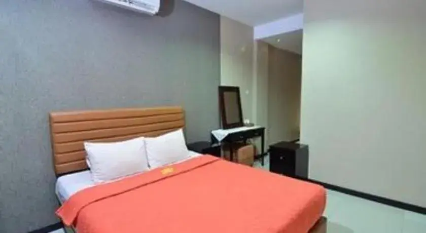 Bed in The Aroma's of Bali Hotel & Residence Bed in The Aroma's of Bali Hotel & Residence