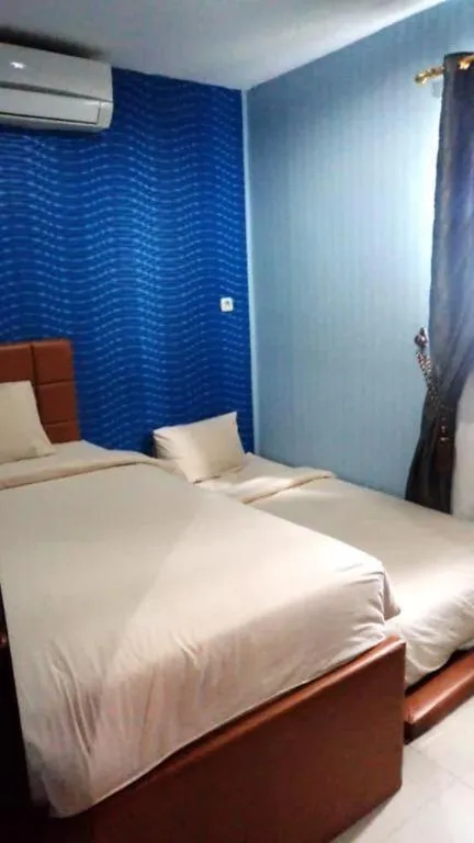 Bed in The Aroma's of Bali Hotel & Residence