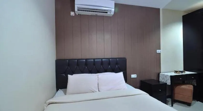 Bed in The Aroma's of Bali Hotel & Residence