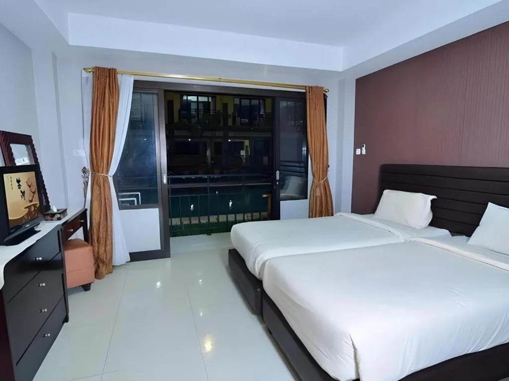 Bed in The Aroma's of Bali Hotel & Residence