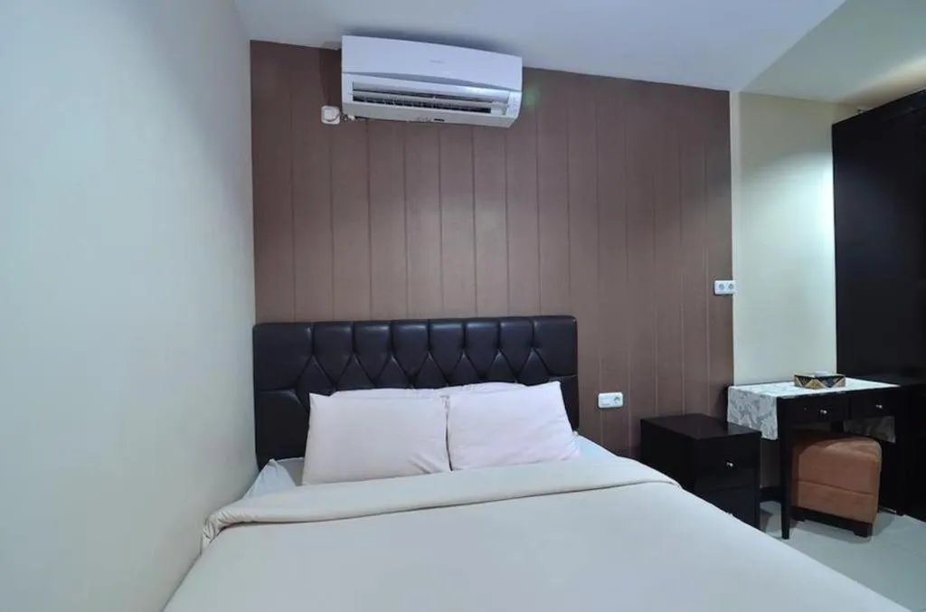 Bed in The Aroma's of Bali Hotel & Residence