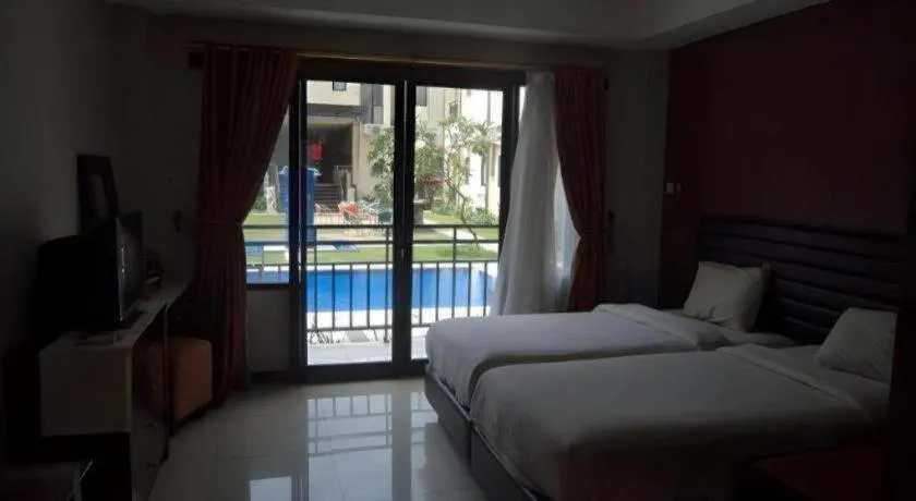 Bed in The Aroma's of Bali Hotel & Residence
