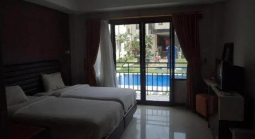 Bed in The Aroma's of Bali Hotel & Residence