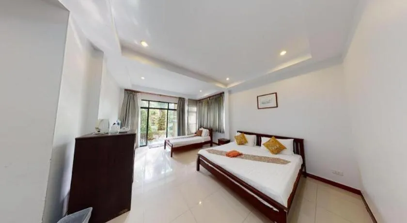 Bed in Nattha Waree Hot Spring Resort and Spa