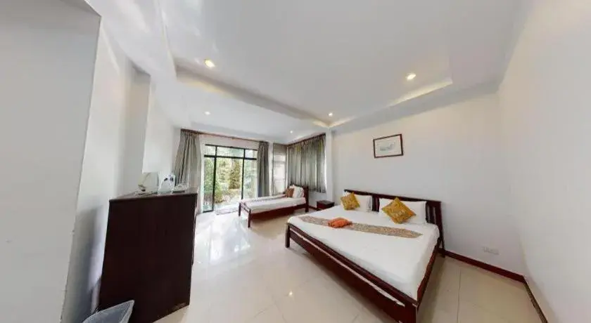Bed in Nattha Waree Hot Spring Resort and Spa Bed in Nattha Waree Hot Spring Resort and Spa
