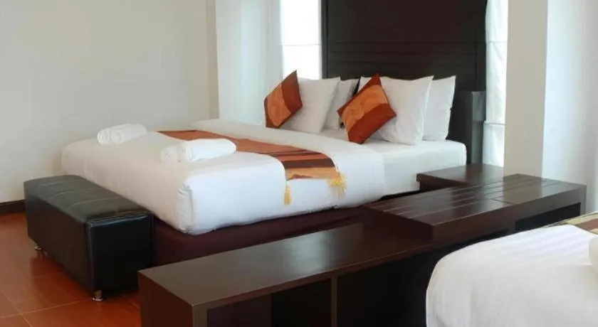 Bed in Nattha Waree Hot Spring Resort and Spa