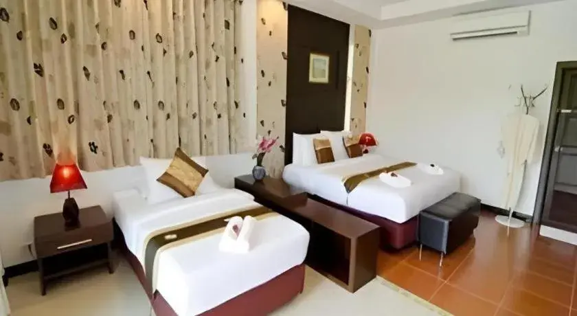 Bed in Nattha Waree Hot Spring Resort and Spa Bed in Nattha Waree Hot Spring Resort and Spa