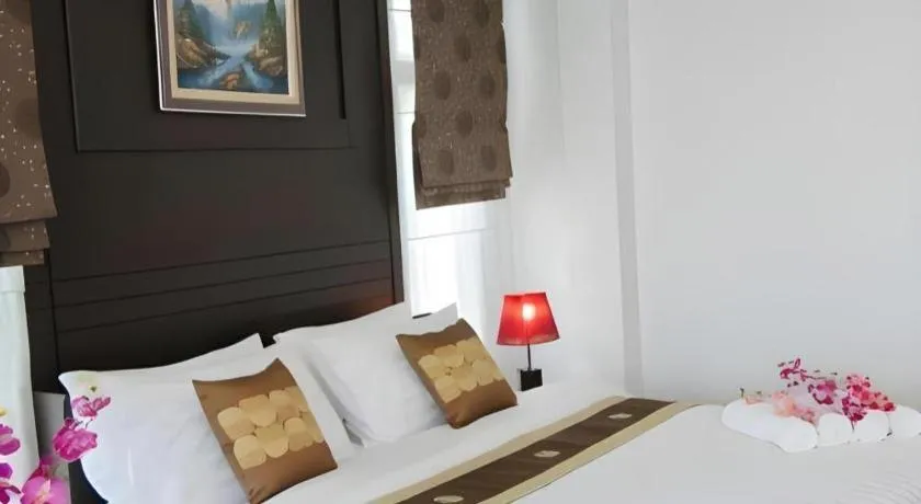 Bed in Nattha Waree Hot Spring Resort and Spa