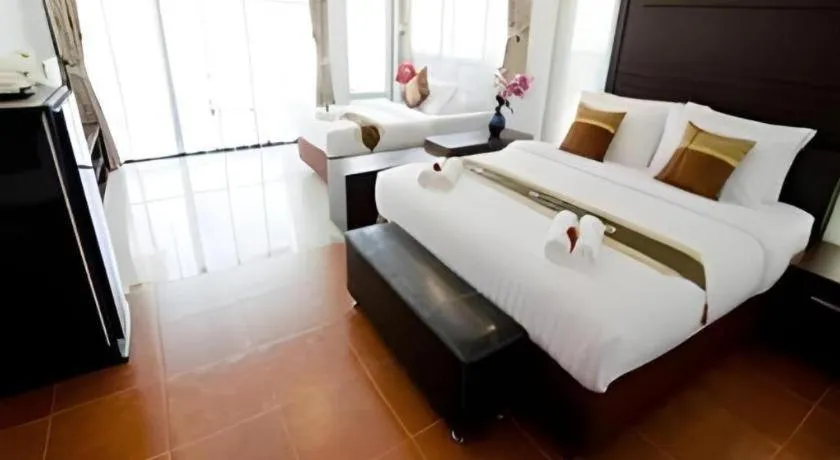 Bed in Nattha Waree Hot Spring Resort and Spa