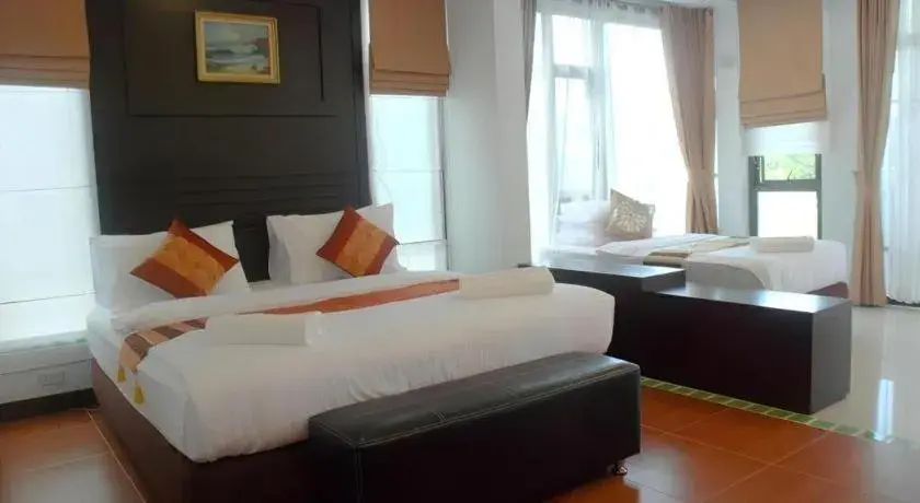Bed in Nattha Waree Hot Spring Resort and Spa Bed in Nattha Waree Hot Spring Resort and Spa