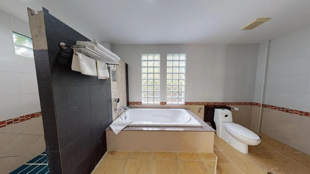 Bed in Nattha Waree Hot Spring Resort and Spa