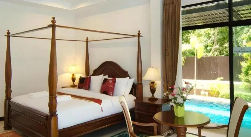 Bed in Nattha Waree Hot Spring Resort and Spa Bed in Nattha Waree Hot Spring Resort and Spa