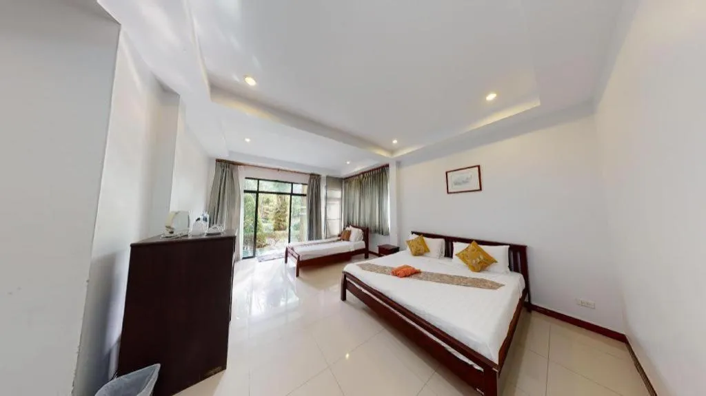 Bed in Nattha Waree Hot Spring Resort and Spa