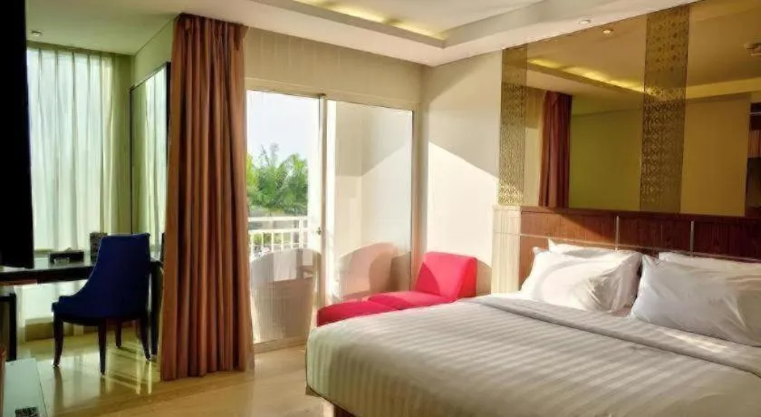 Bed in CLARO Makassar Hotel & Convention