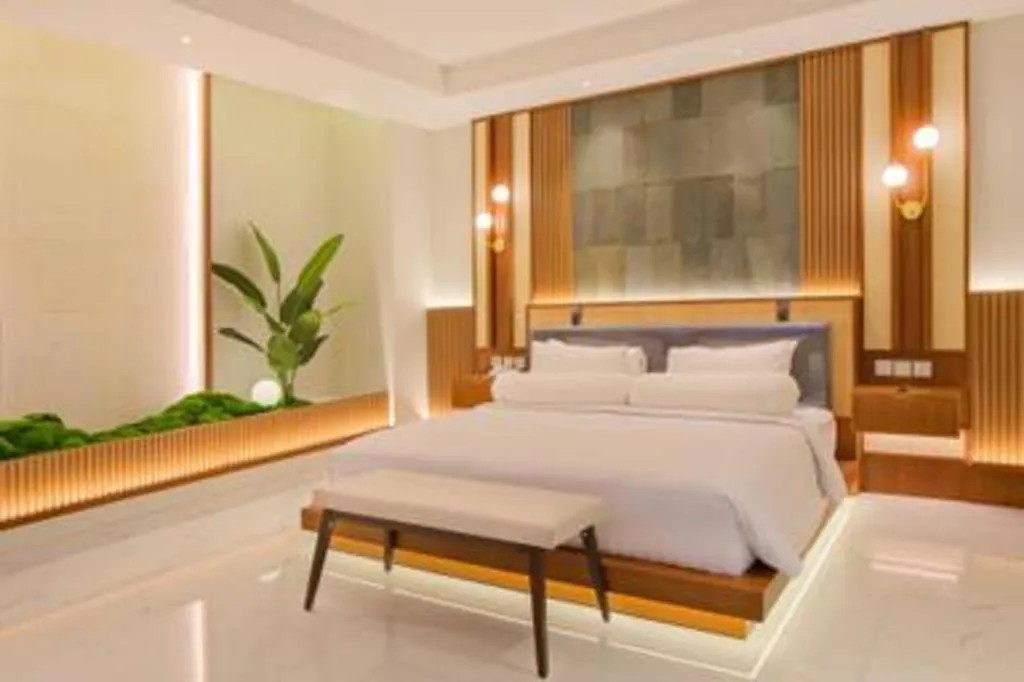 Bed in CLARO Makassar Hotel & Convention