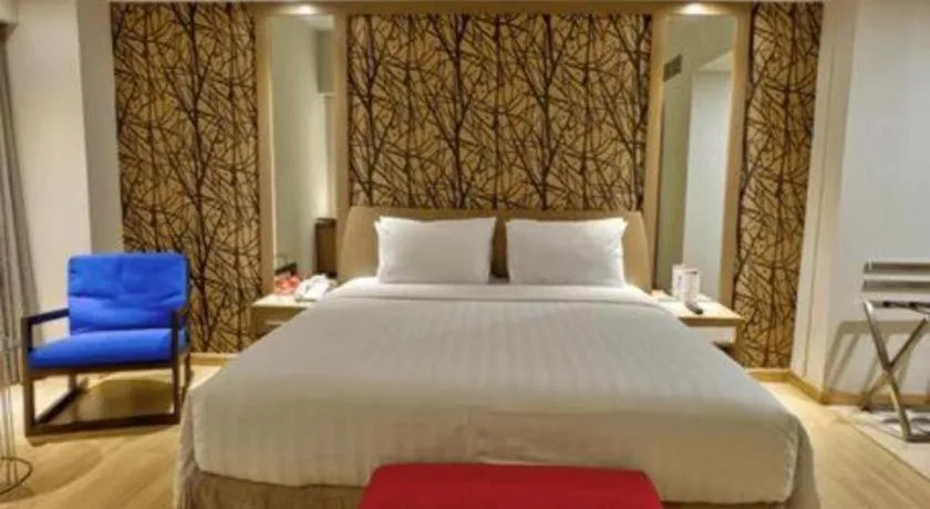 Bed in CLARO Makassar Hotel & Convention