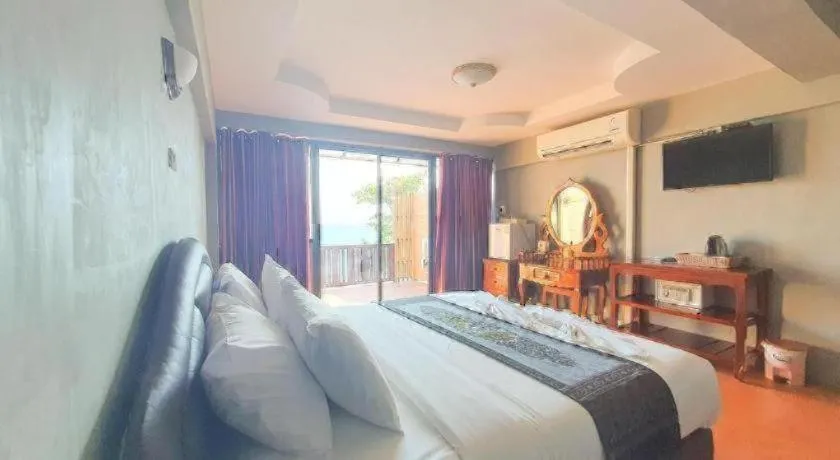 Bed in Jirawan Hotel