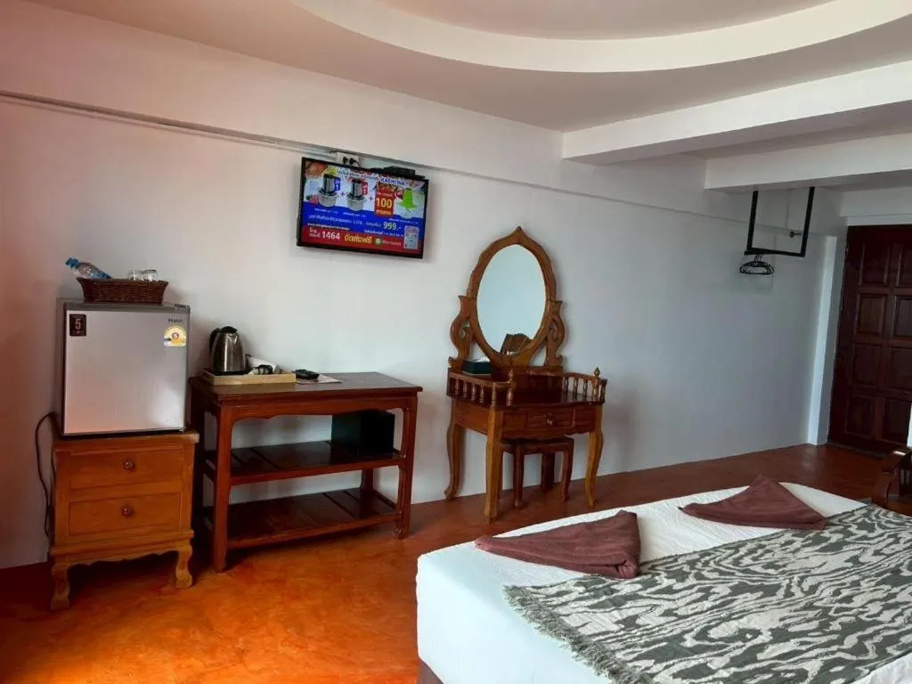 Bed in Jirawan Hotel