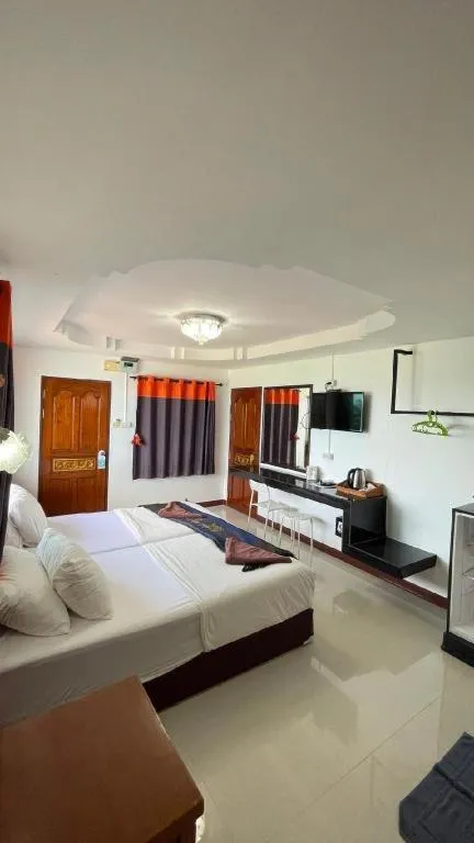 Bed in Jirawan Hotel