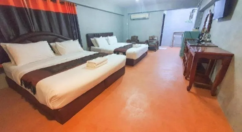 Bed in Jirawan Hotel