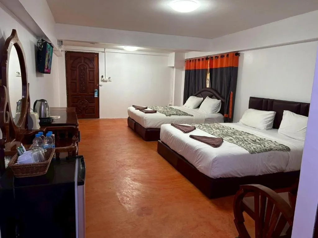 Bed in Jirawan Hotel