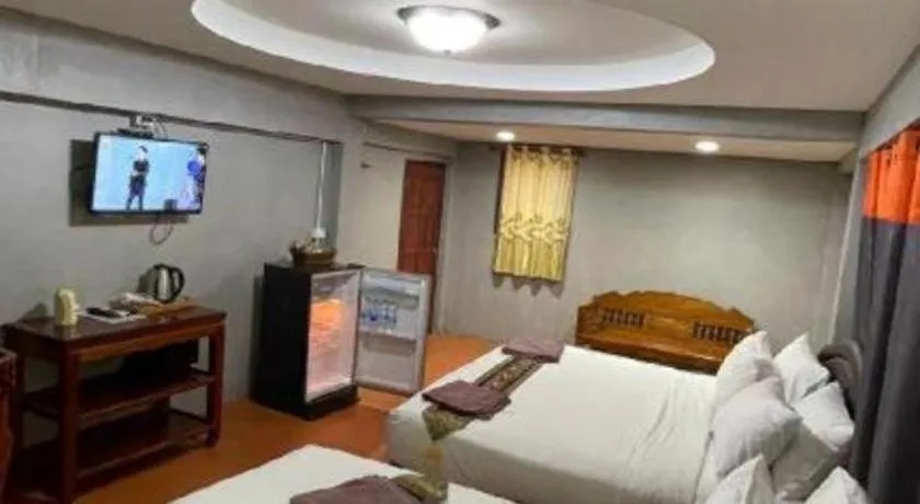 Bed in Jirawan Hotel