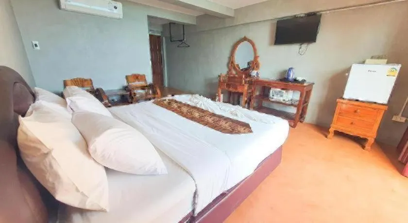 Bed in Jirawan Hotel
