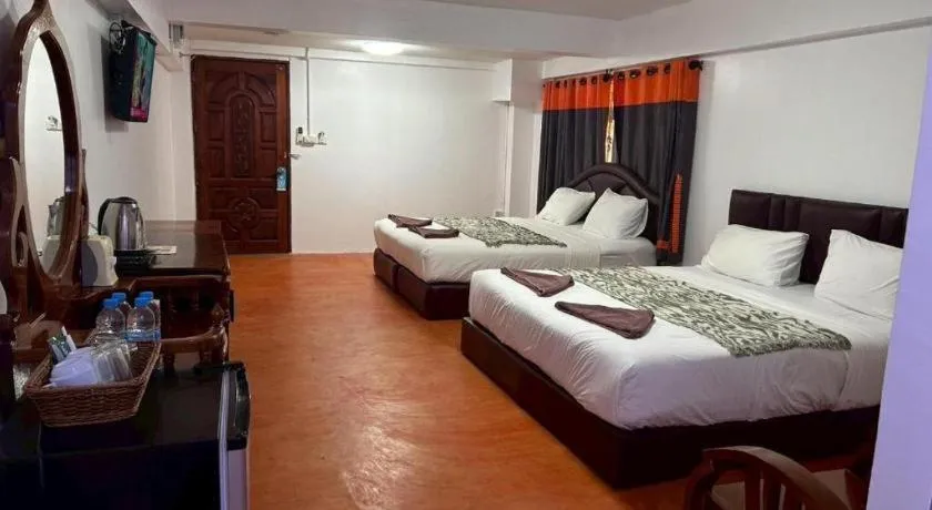 Bed in Jirawan Hotel