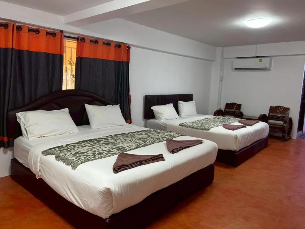 Bed in Jirawan Hotel