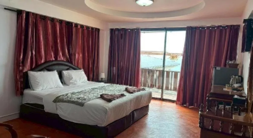 Bed in Jirawan Hotel