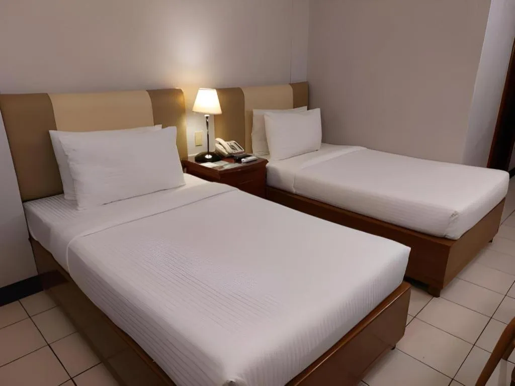 Bed in Las Palmas Hotel de Manila