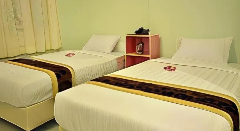 Bed in Piyaporn Hill Paradise Hotel