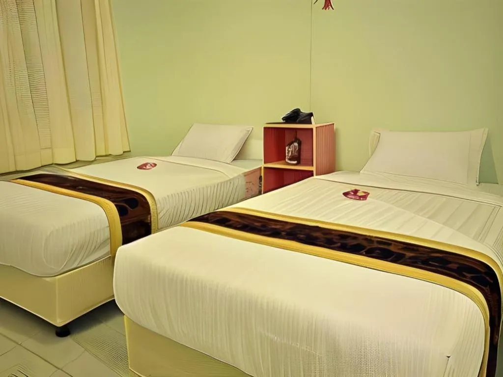 Bed in Piyaporn Hill Paradise Hotel