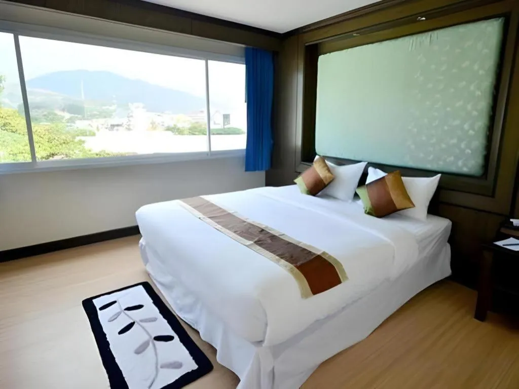 Bed in Piyaporn Hill Paradise Hotel