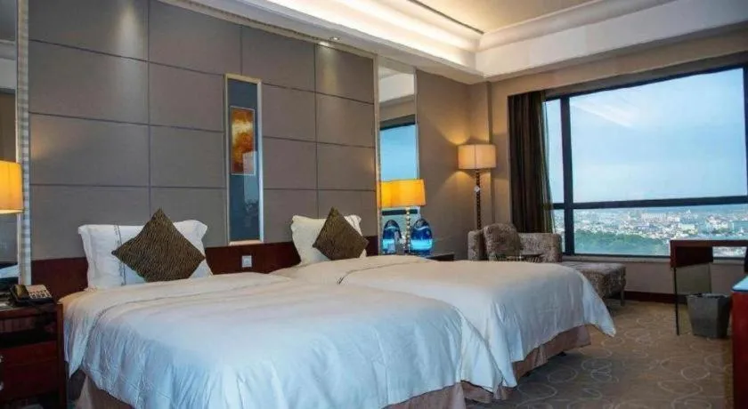 Bed in Wellton International Hotel