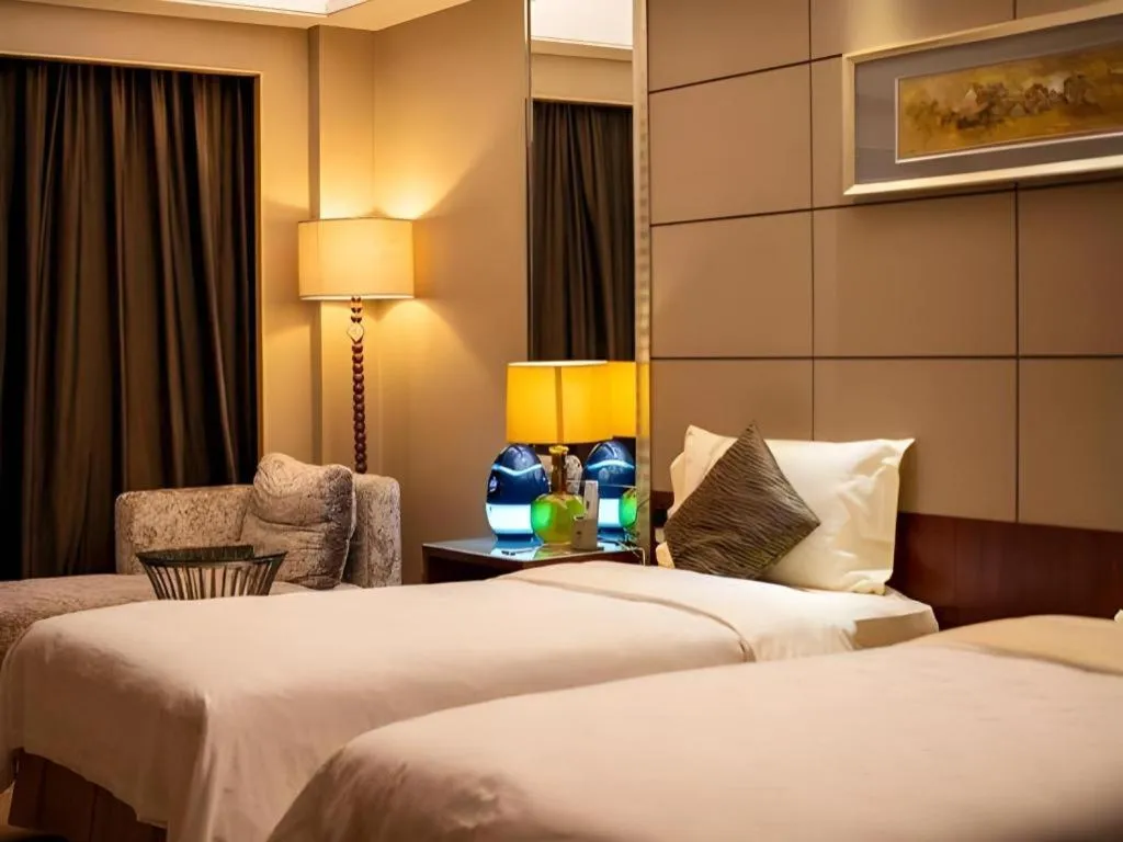 Bed in Wellton International Hotel