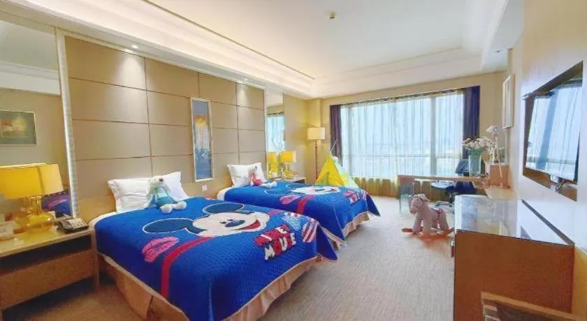 Bed in Wellton International Hotel