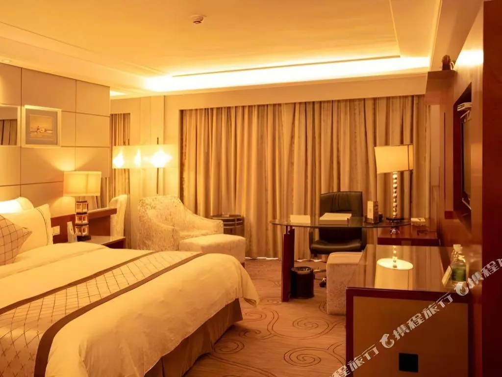 Bed in Wellton International Hotel