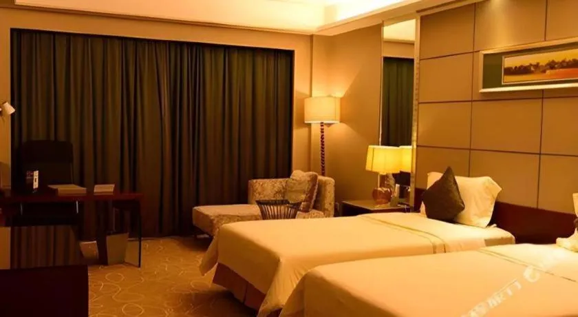 Bed in Wellton International Hotel