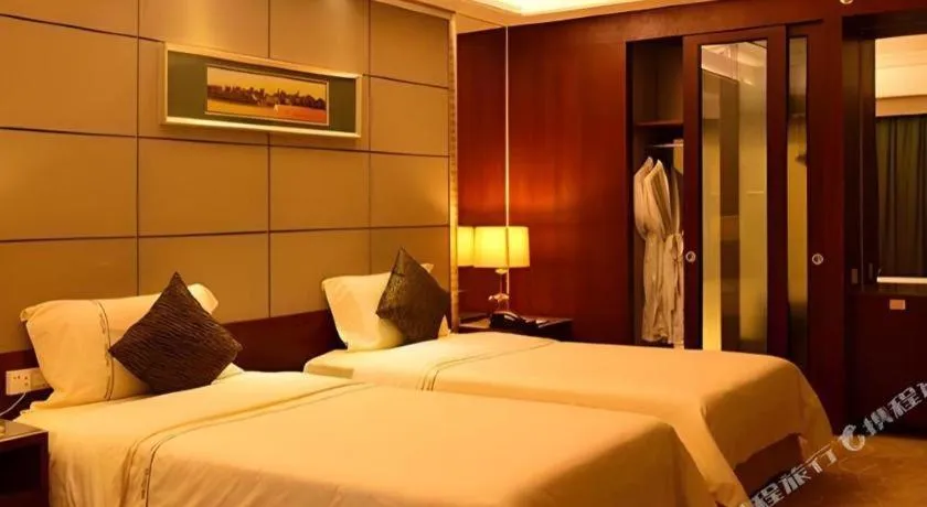 Bed in Wellton International Hotel