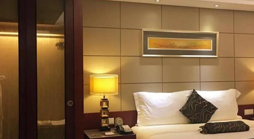 Bed in Wellton International Hotel