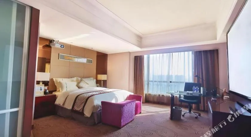 Bed in Wellton International Hotel