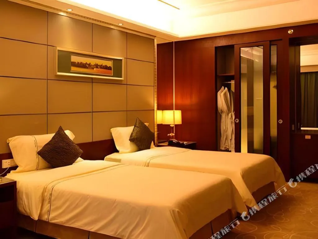 Bed in Wellton International Hotel