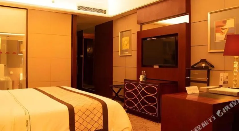 Bed in Wellton International Hotel