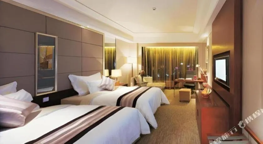 Bed in Wellton International Hotel