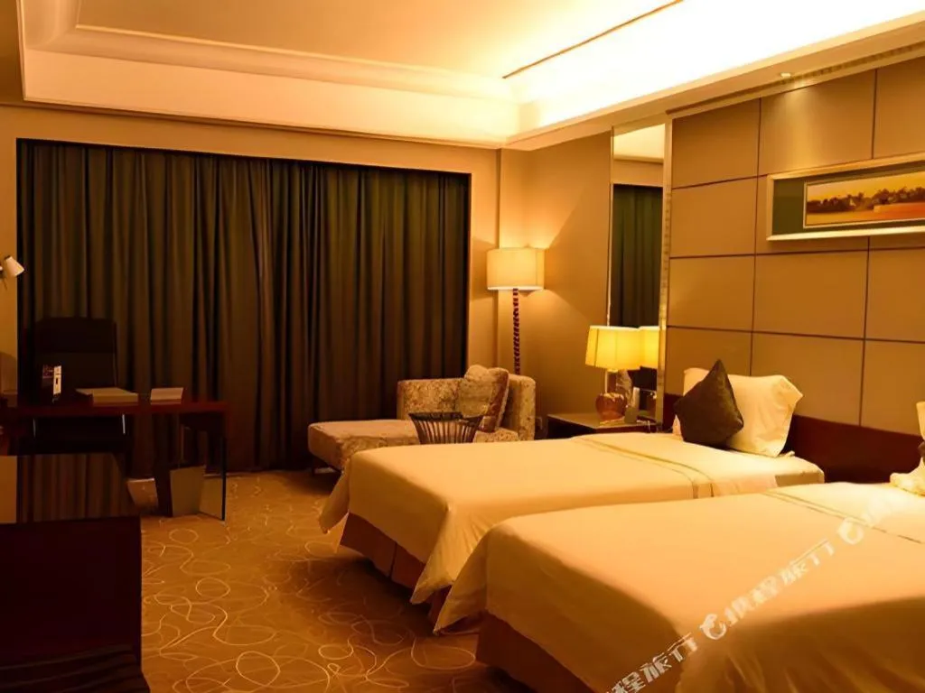 Bed in Wellton International Hotel