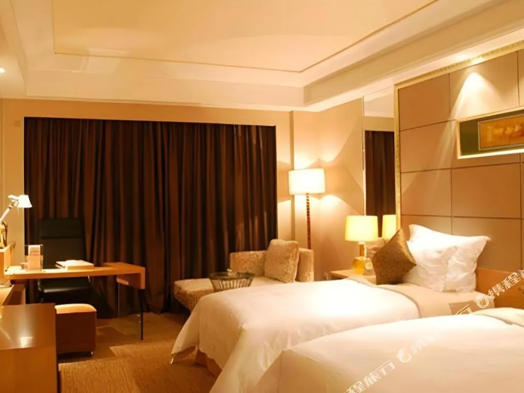 Bed in Wellton International Hotel