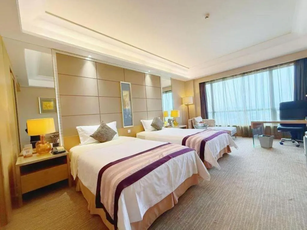 Bed in Wellton International Hotel